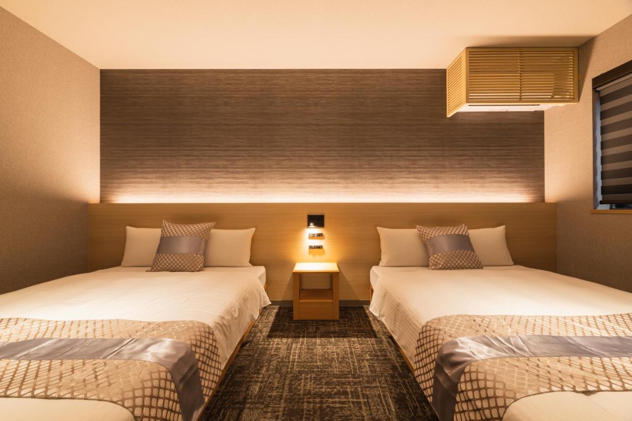 Grand Base Kagoshima Chuo Aparthotel Buitenkant foto