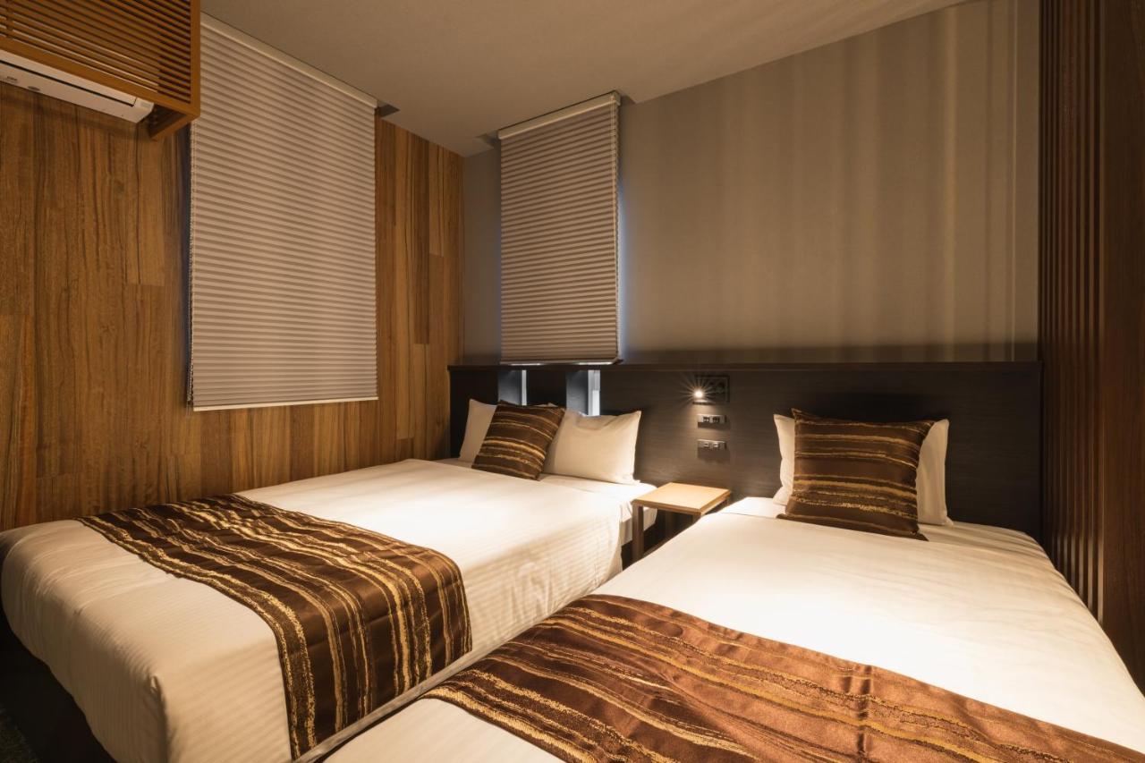 Grand Base Kagoshima Chuo Aparthotel Buitenkant foto